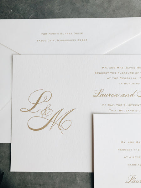 gold-monogram-script-wedding-invitation-classy