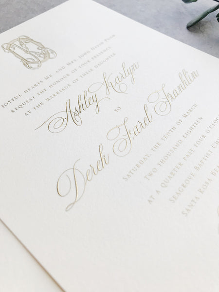 gold-foil-monogram-seal-calligraphy-navy-wedding-invitation