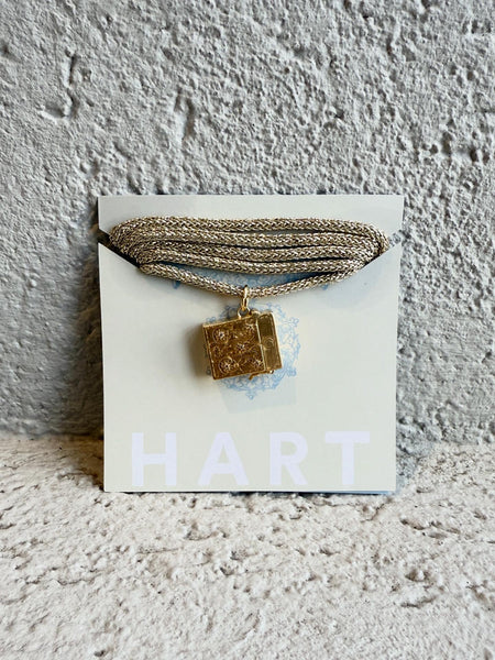 Etched Vesta Case Charm on Gold Lurex Necklace Cord