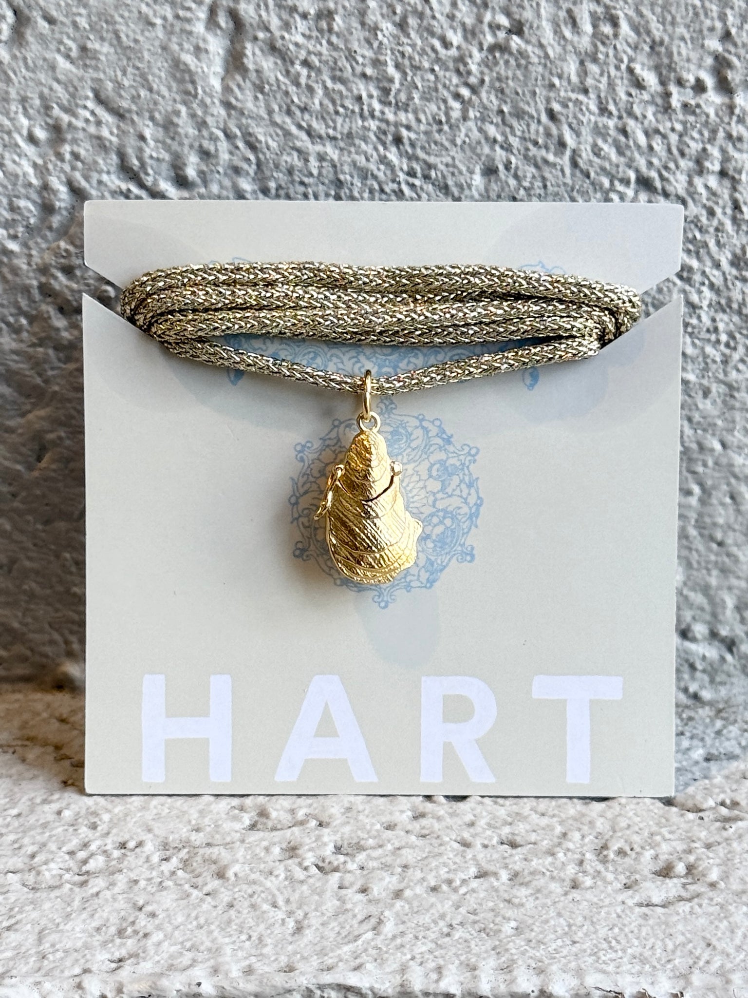 Oyster Vesta Charm on Gold Lurex Necklace Cord