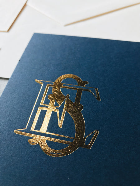 navy-gold-crest-wedding-invitation-calligraphy-monogram